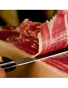 Corte a cuchillo y envasado de jamón